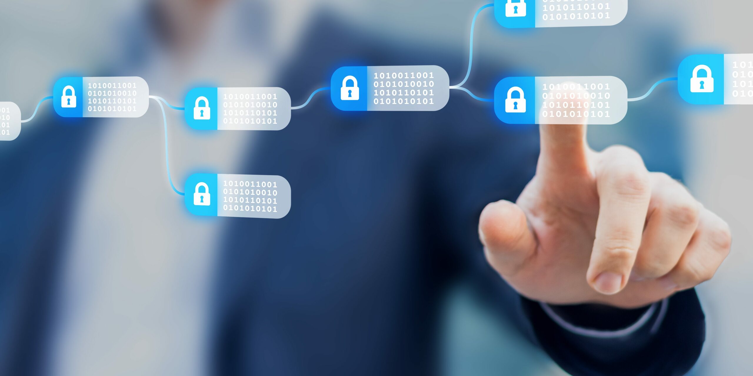 man with finger on digital blockchain
