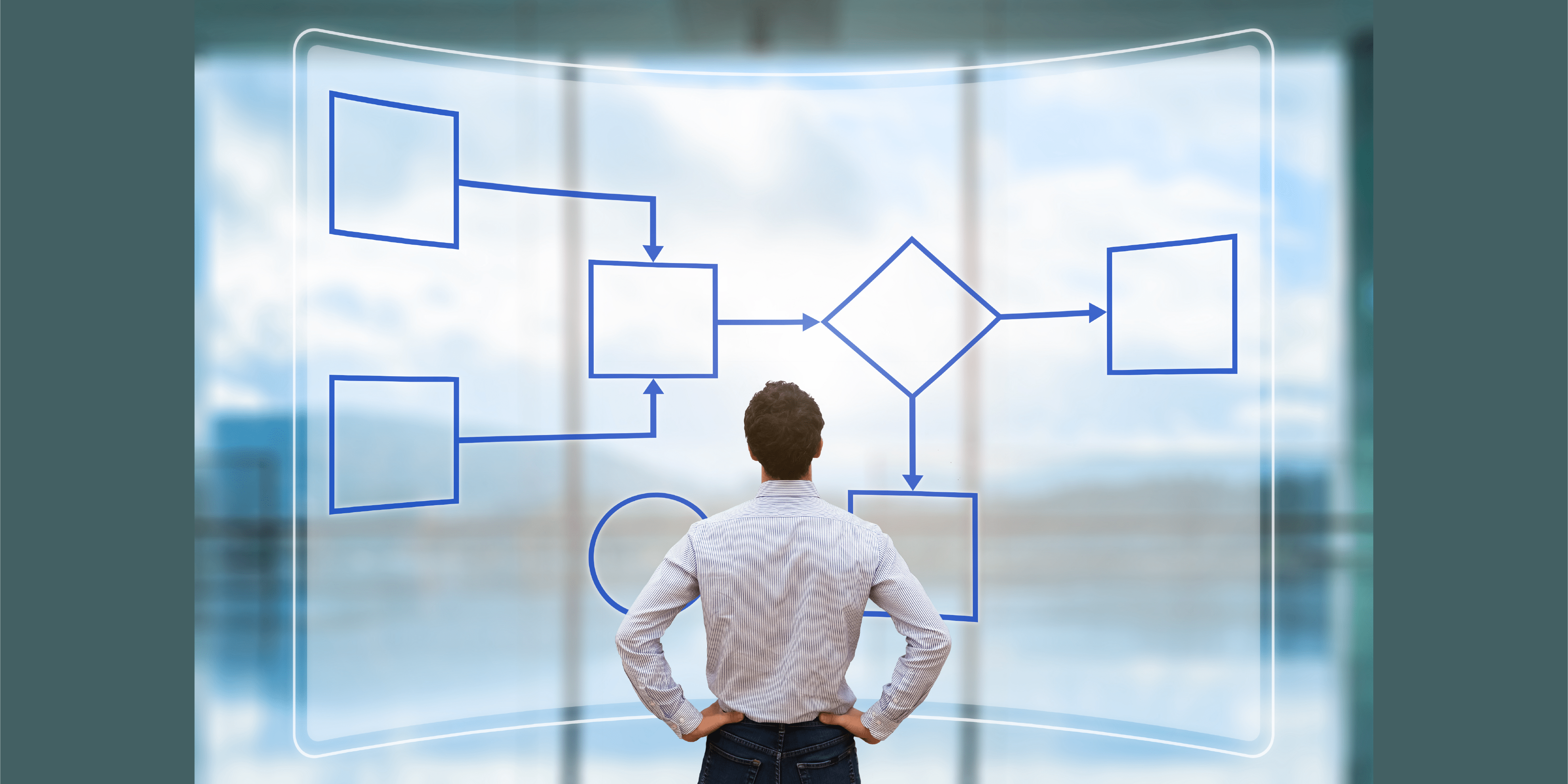 man standing in front of directional chart