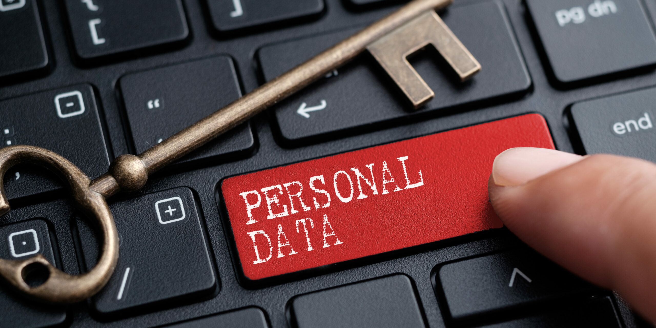 closeup of keyboard with key and personal date button