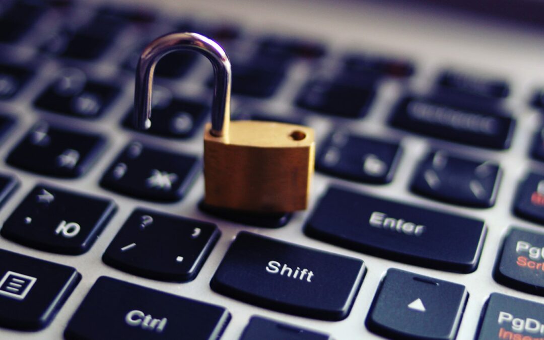 padlock on top of laptop keyboard