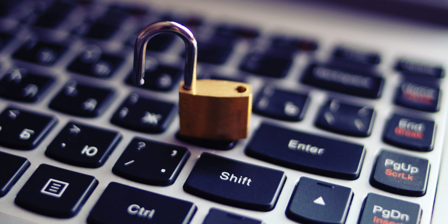 padlock on top of laptop keyboard